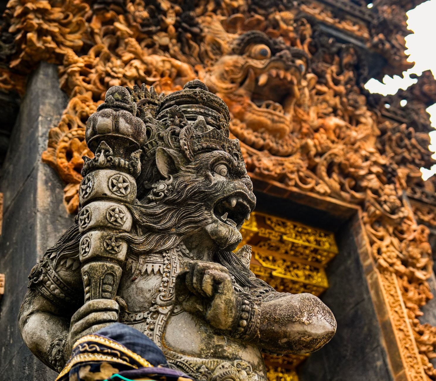 A Bhoma face carved over a gate arch, exactly where you meet it entering many Balinese temples.