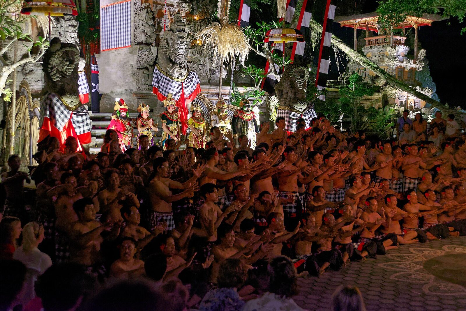 Kecak performers around the fire candelabrum, Bali