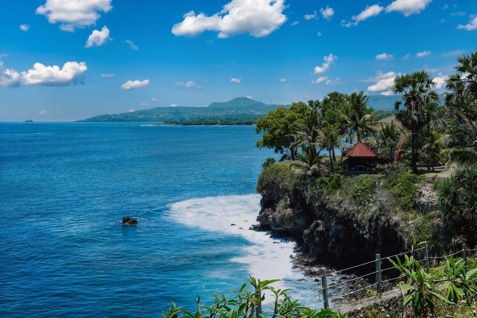 Rugged, empty coastline and open sea — west Bali keeps its distance from the crowds.