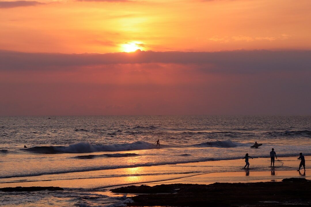Sunset on the beach at Canggu, the crowd out for the daily ritual.