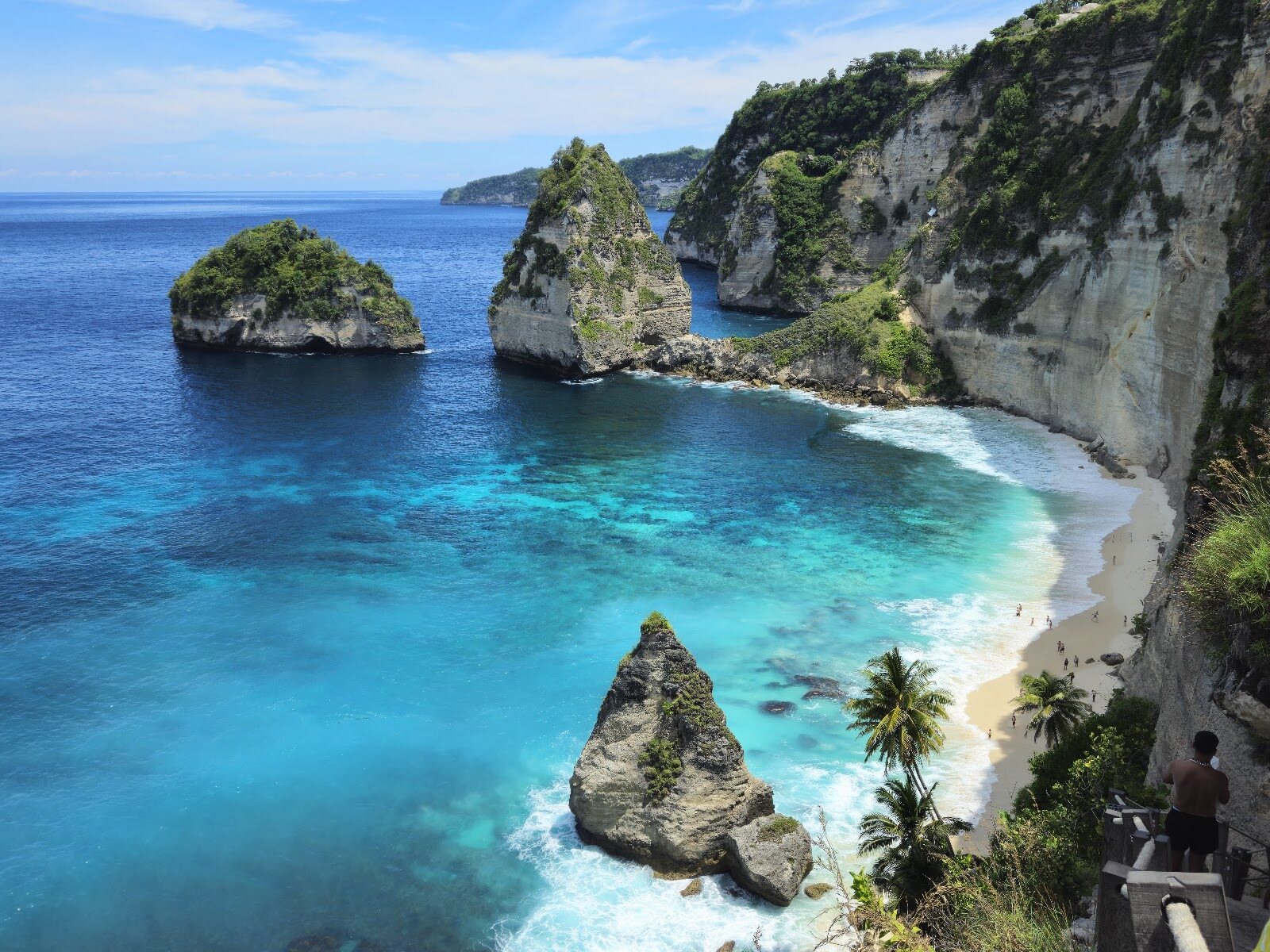 The rock spires of Diamond Beach on Penida's east coast — dramatic, and a steep climb down.