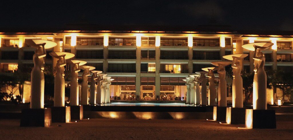 A grand Nusa Dua resort lit up at night — this is the handled end of Bali.