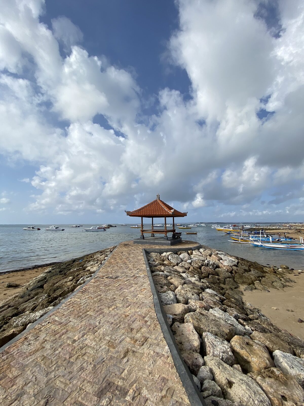 The flat paved seafront promenade that runs the length of Sanur — easy walking, and a big part of why families and older travellers love it.