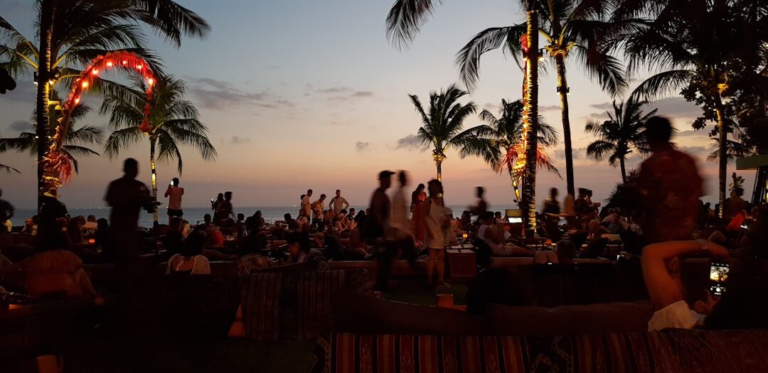 A beach club filling up at dusk — the sunset-drinks ritual Seminyak is built around.