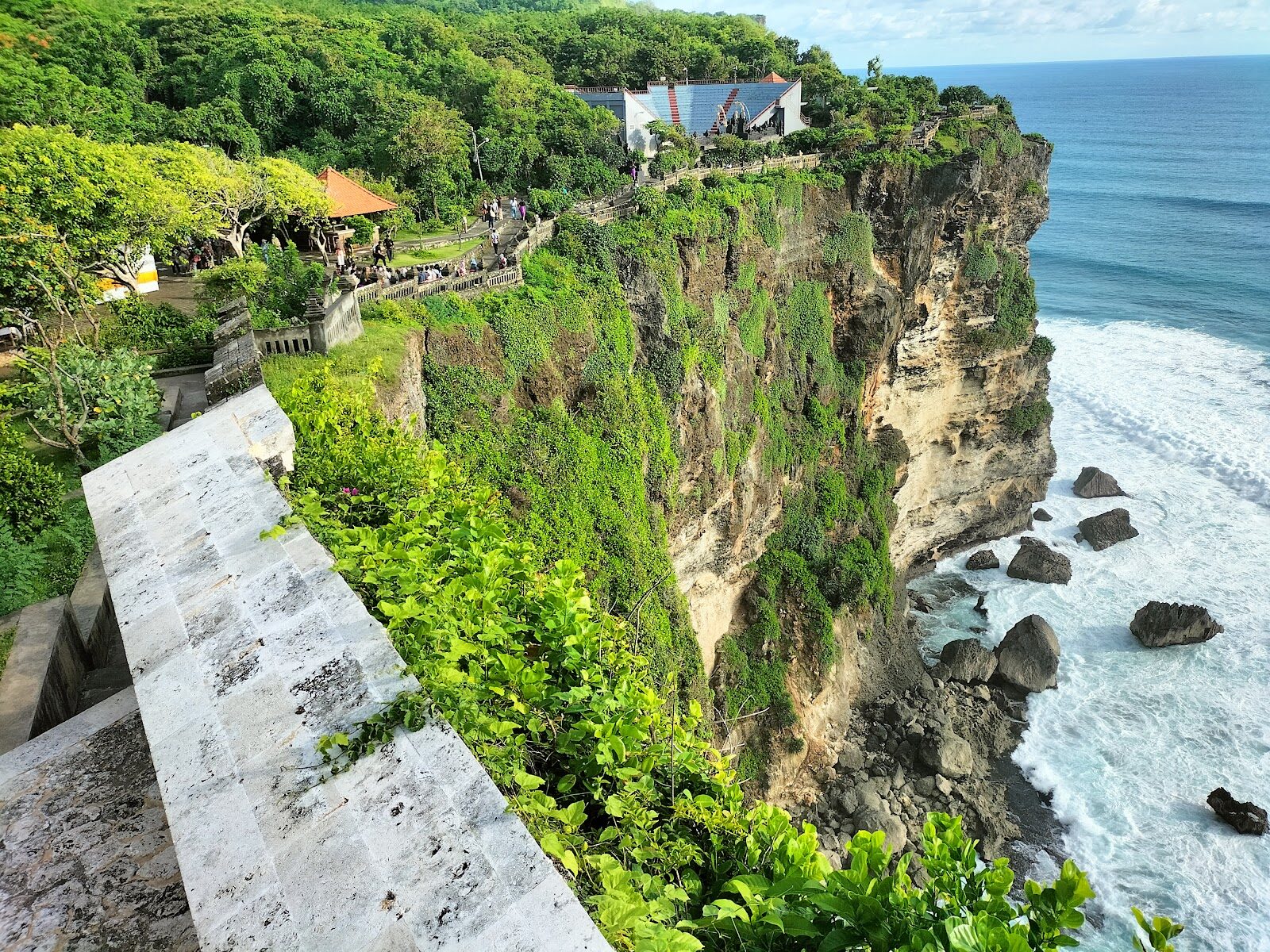 A clifftop terrace over the open ocean — the cliff-edge view you're paying for out here.