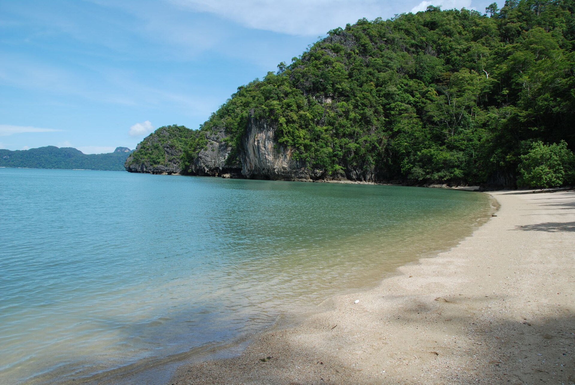 Tanjung Rhu's pale sand and the karst islets offshore, north Langkawi.